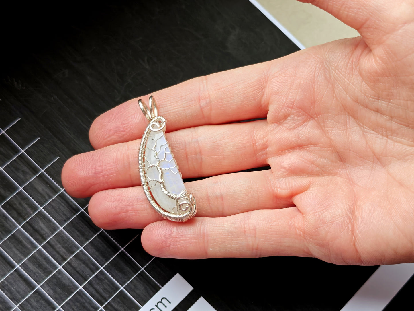 Tree pendant with a broken moonstone