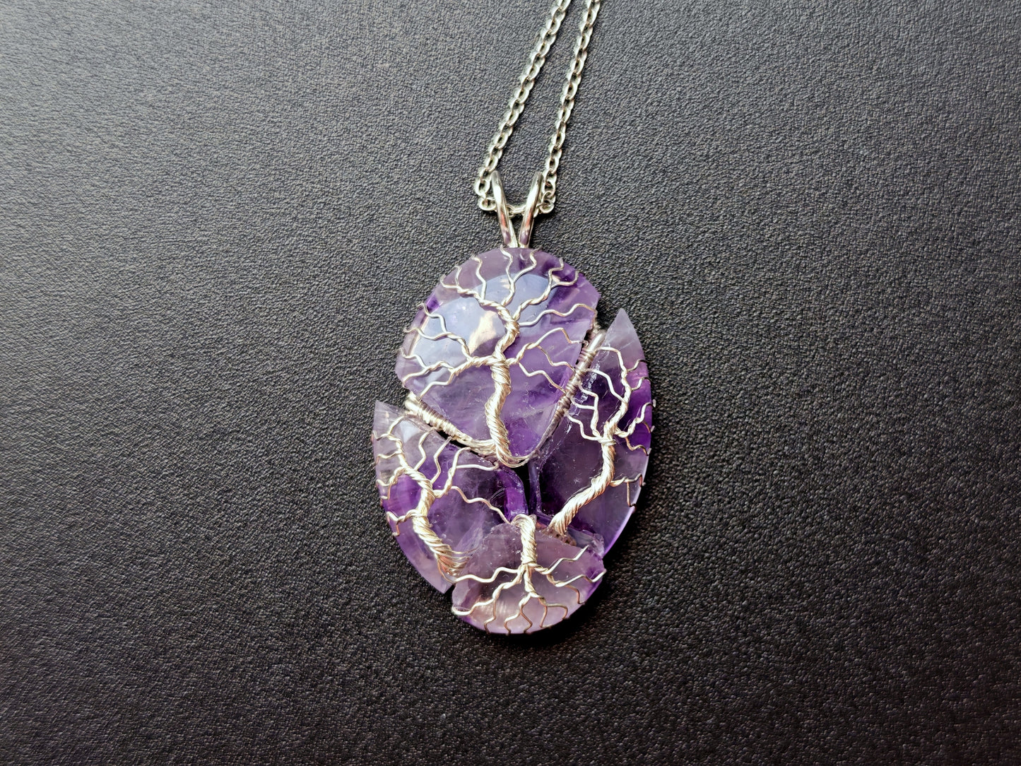 Tree pendant with a broken amethyst gemstone
