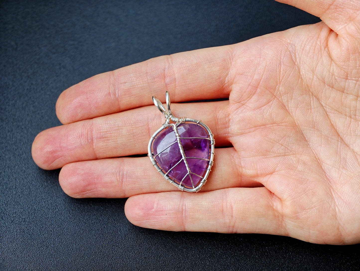 Leaf pendant with an amethyst gemstone