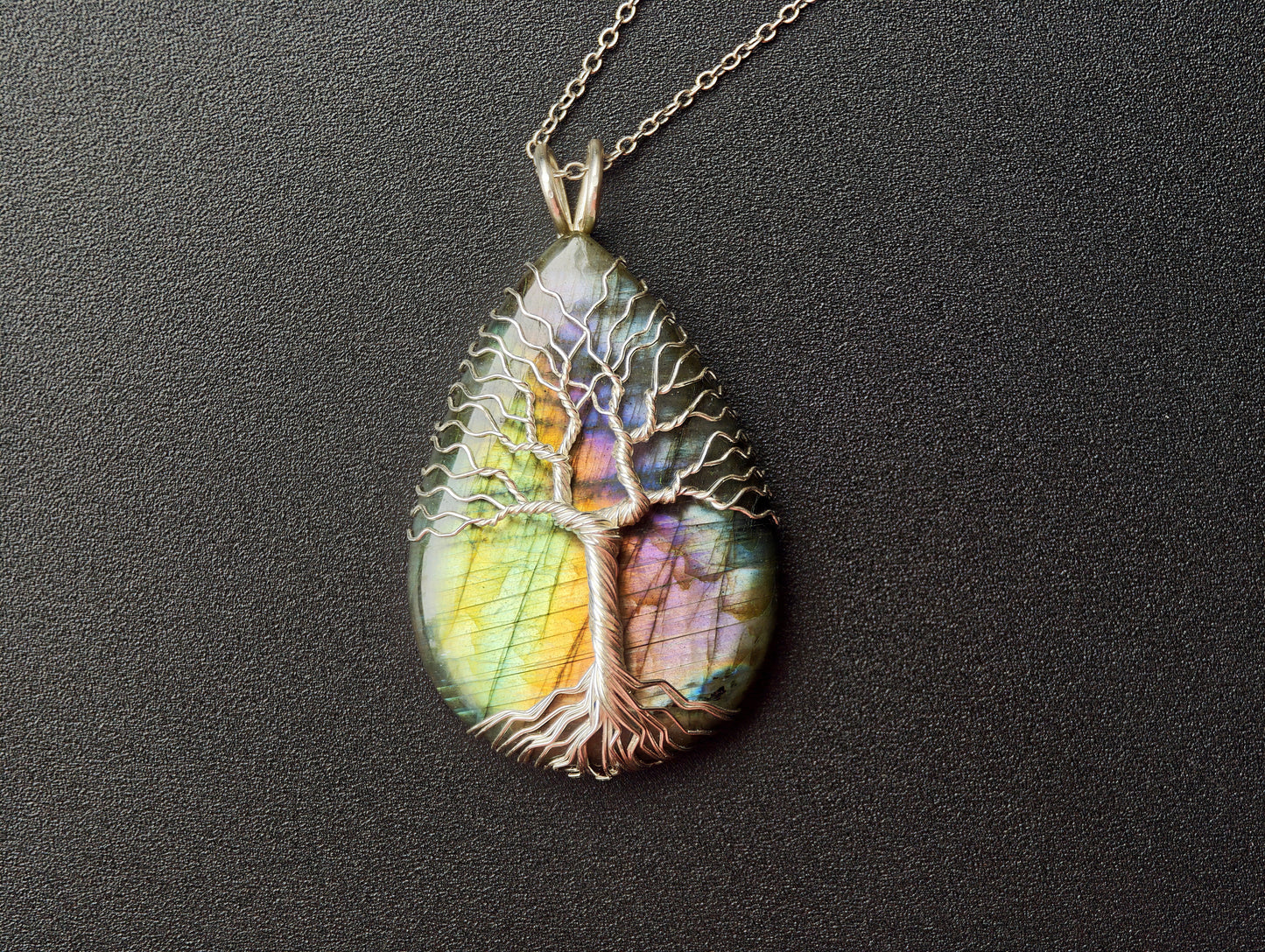 Tree pendant with a labradorite gemstone