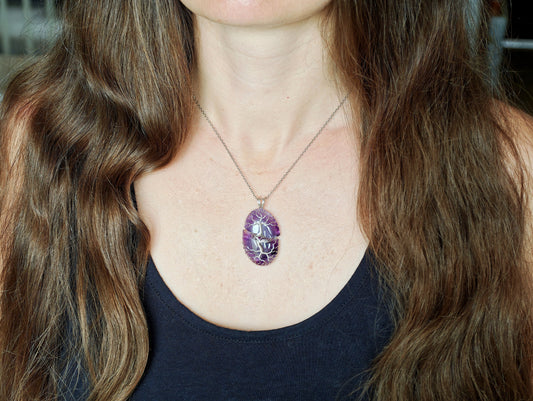 Tree pendant with a broken amethyst gemstone