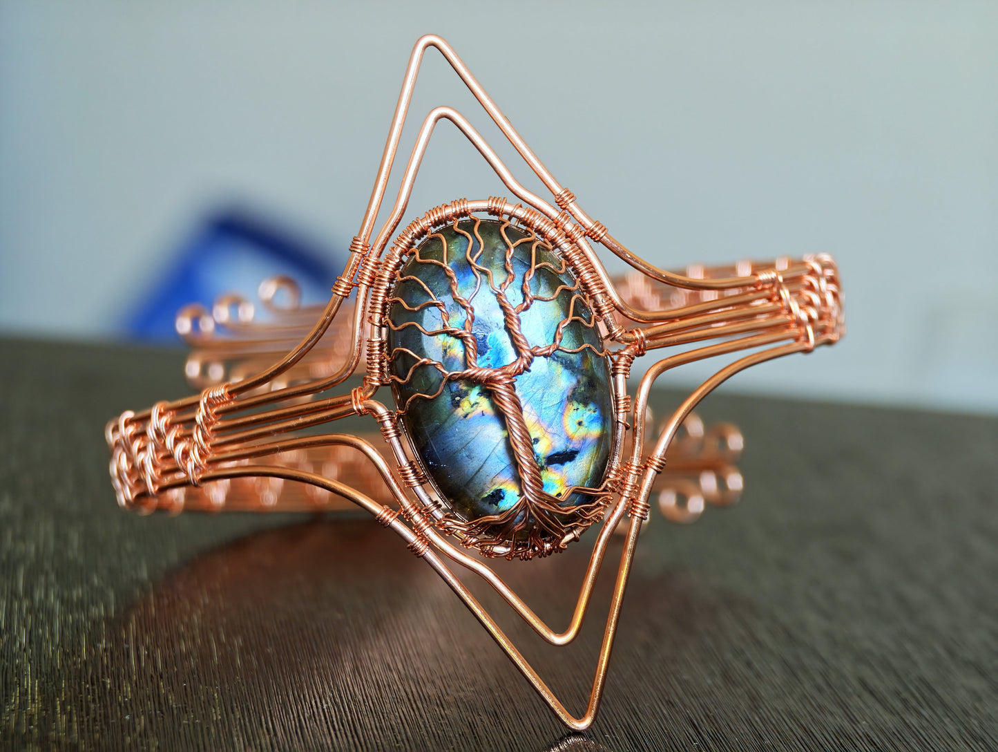 Tree arm ring with a labradorite gemstone