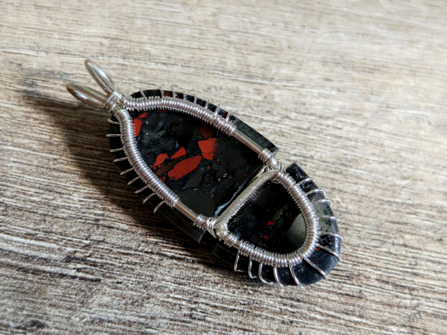 Tree pendant with a broken bloodstone gemstone