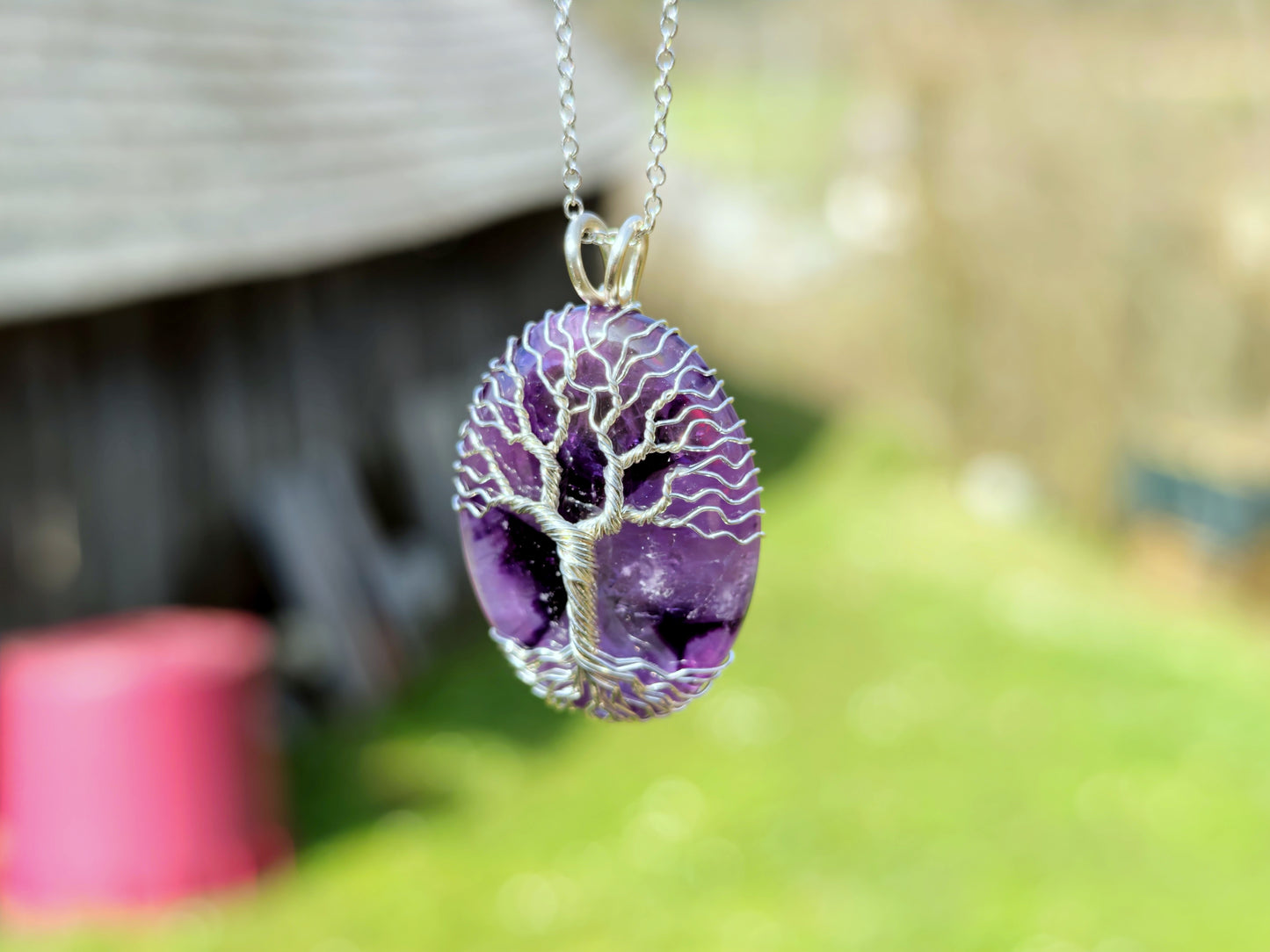 Tree pendant with an amethyst gemstone