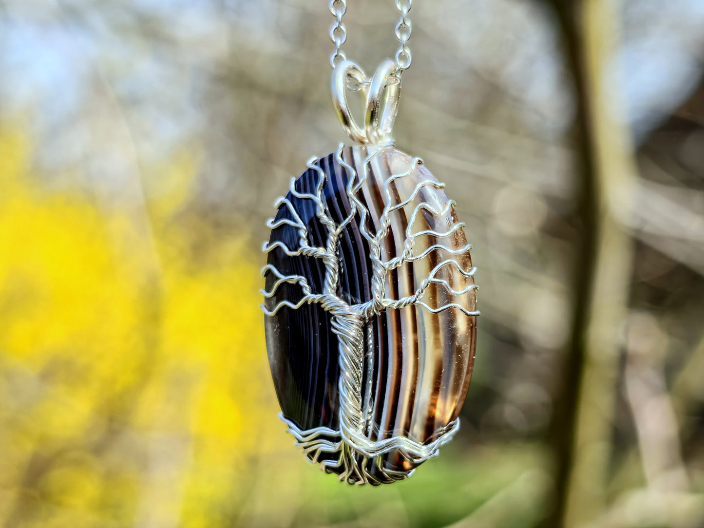 Tree pendant with a black onyx gemstone