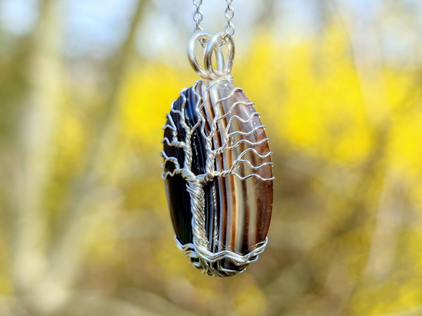 Tree pendant with a black onyx gemstone