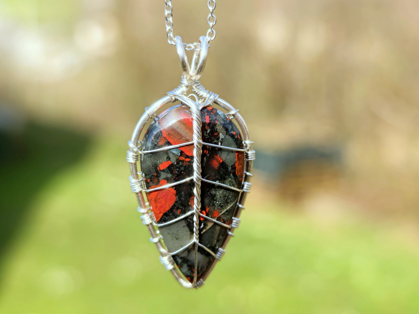 Leaf pendant with a bloodstone gemstone