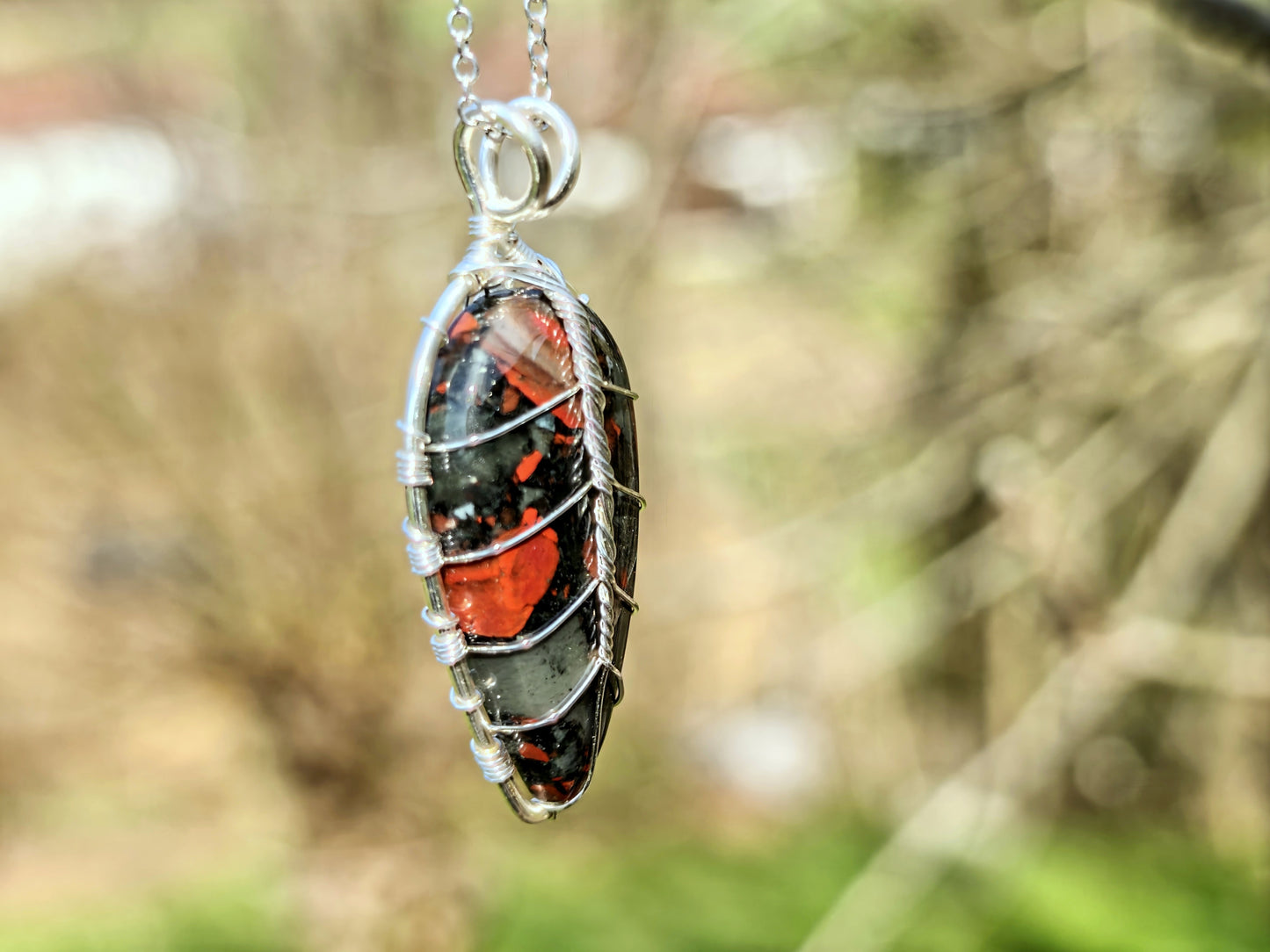 Leaf pendant with a bloodstone gemstone