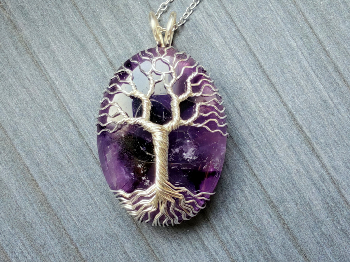 Tree pendant with an amethyst gemstone