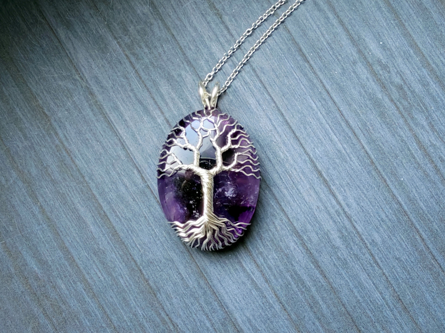 Tree pendant with an amethyst gemstone