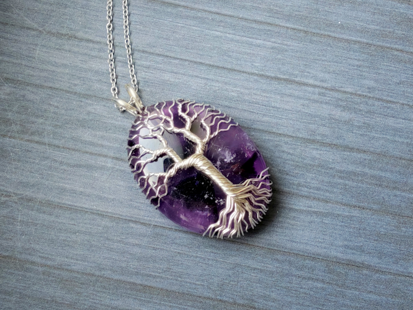 Tree pendant with an amethyst gemstone