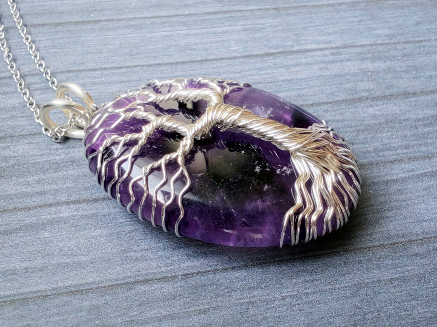 Tree pendant with an amethyst gemstone