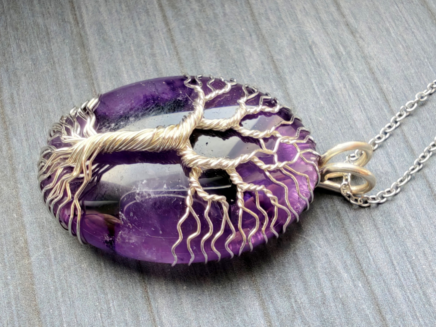 Tree pendant with an amethyst gemstone