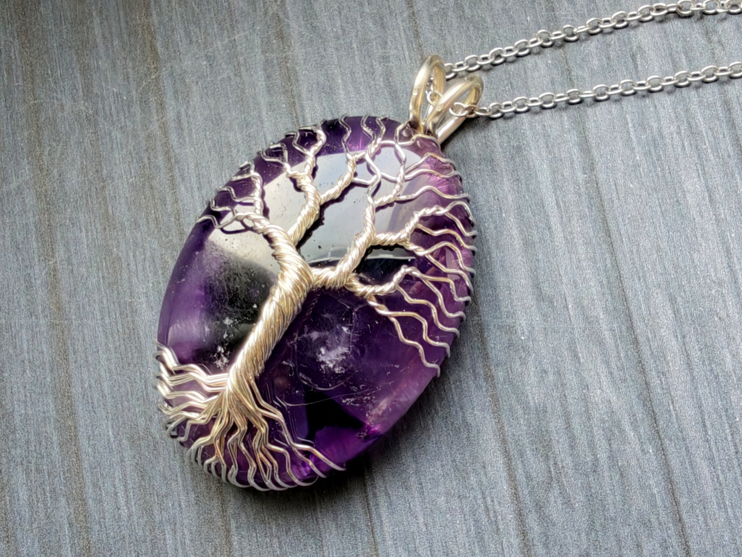 Tree pendant with an amethyst gemstone