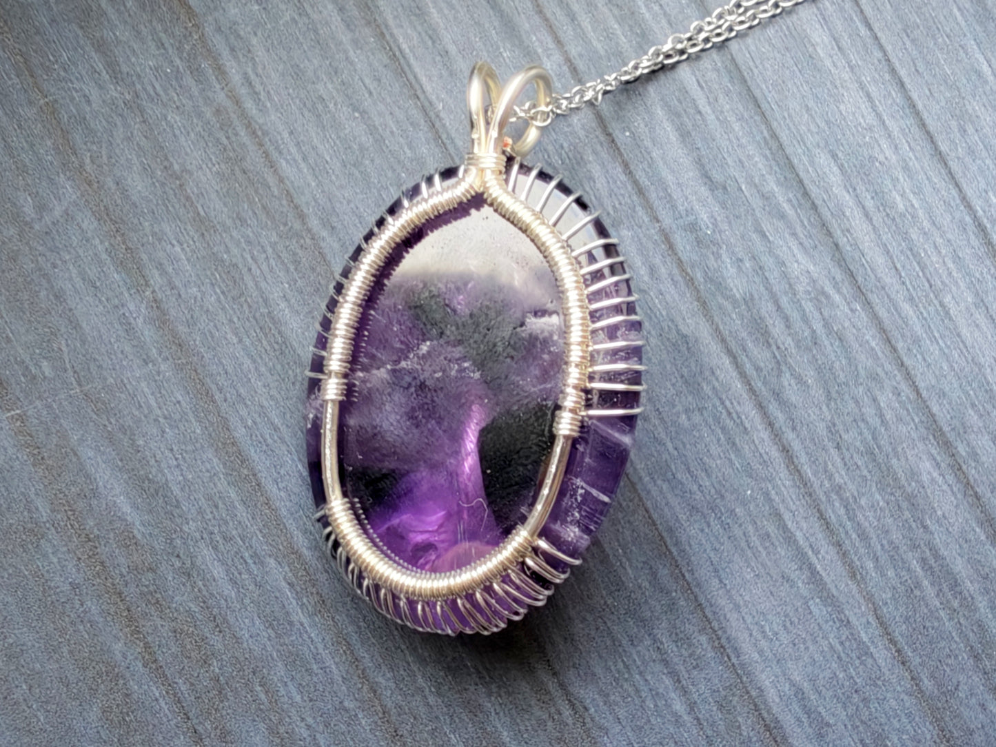 Tree pendant with an amethyst gemstone