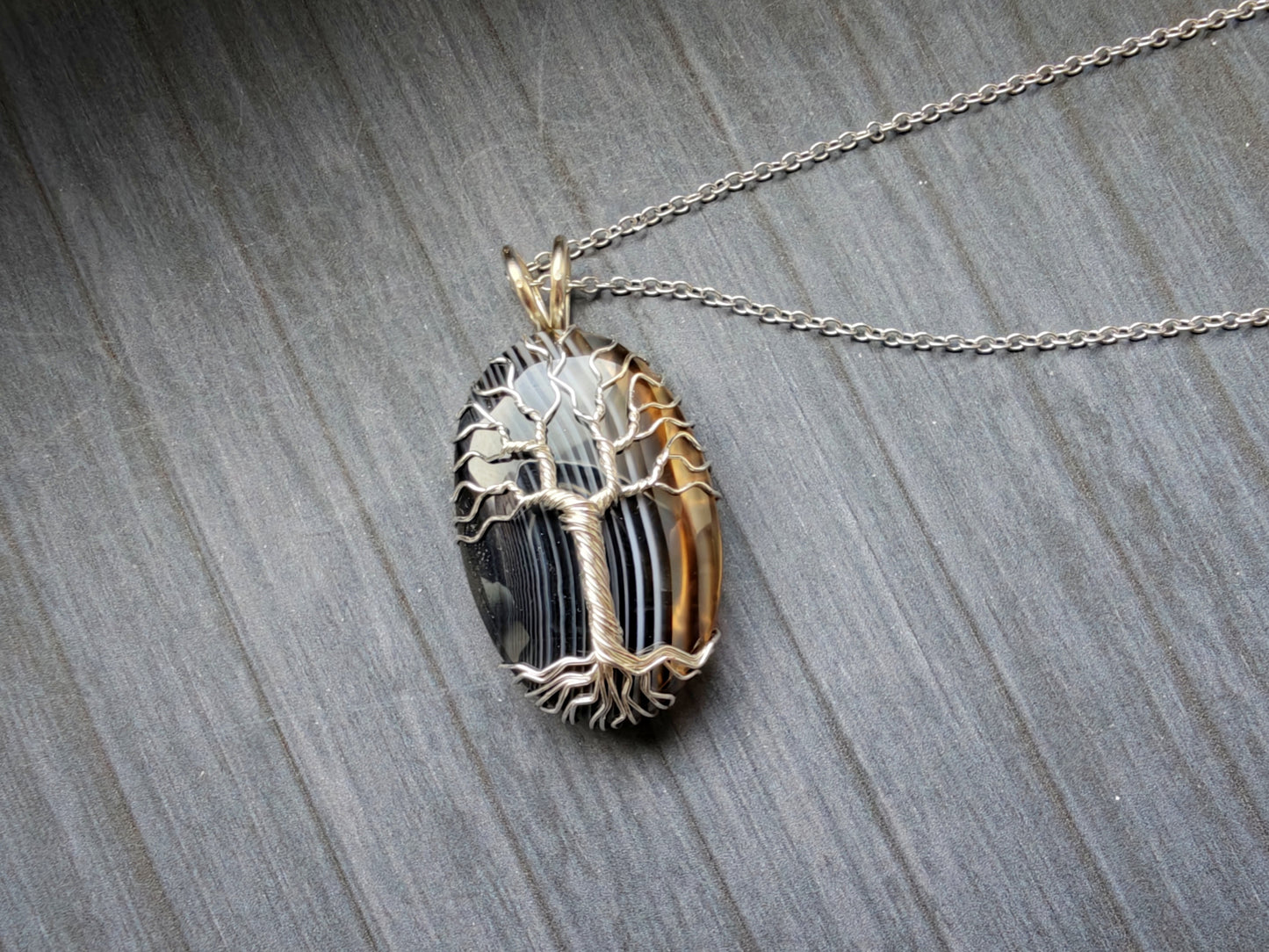 Tree pendant with a black onyx gemstone