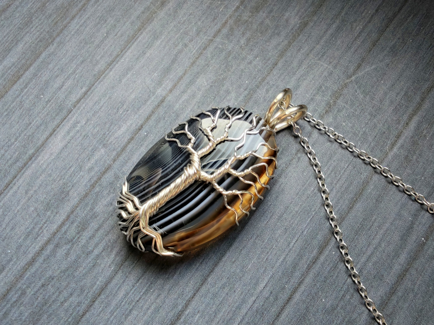 Tree pendant with a black onyx gemstone