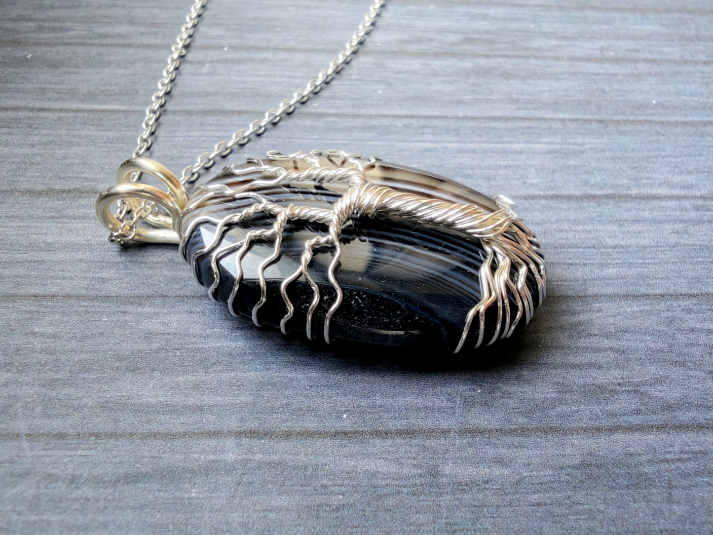 Tree pendant with a black onyx gemstone
