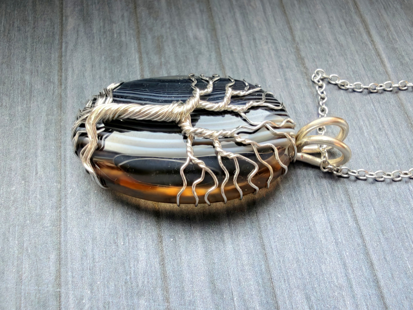 Tree pendant with a black onyx gemstone