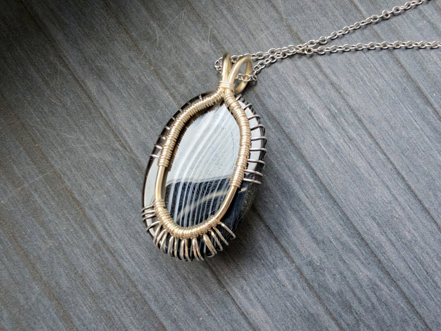 Tree pendant with a black onyx gemstone