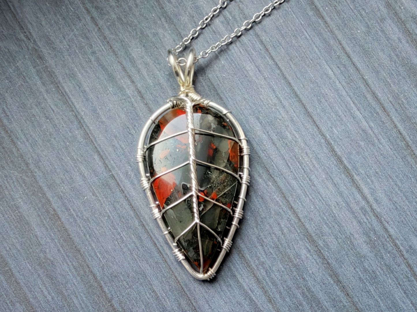 Leaf pendant with a bloodstone gemstone