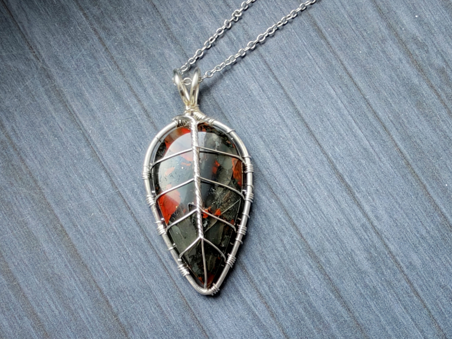 Leaf pendant with a bloodstone gemstone