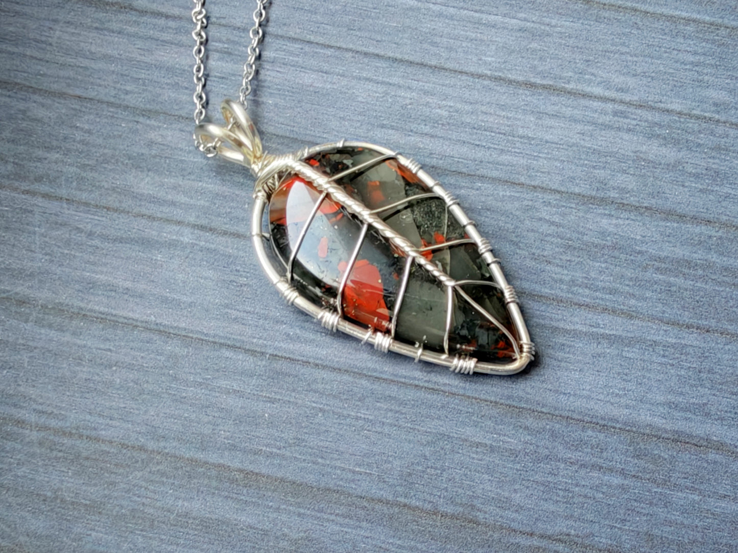 Leaf pendant with a bloodstone gemstone
