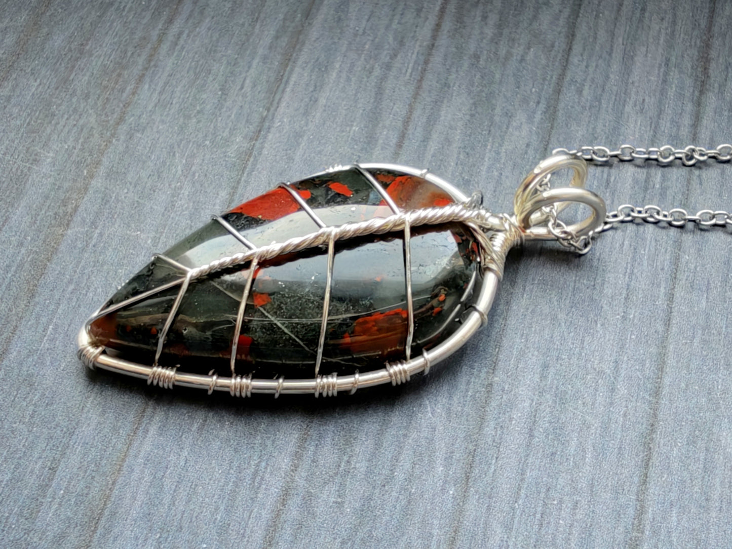 Leaf pendant with a bloodstone gemstone