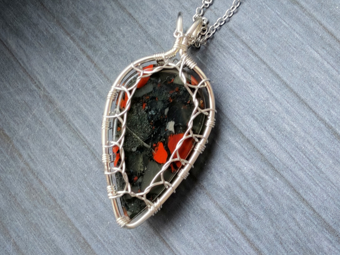 Leaf pendant with a bloodstone gemstone