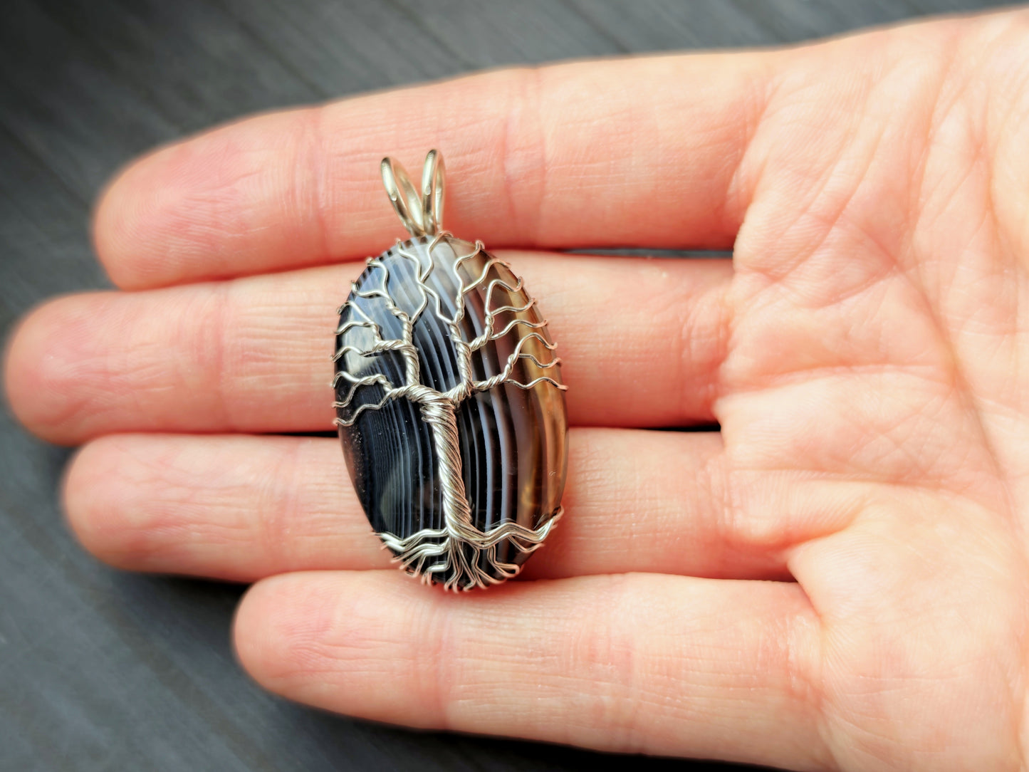 Tree pendant with a black onyx gemstone