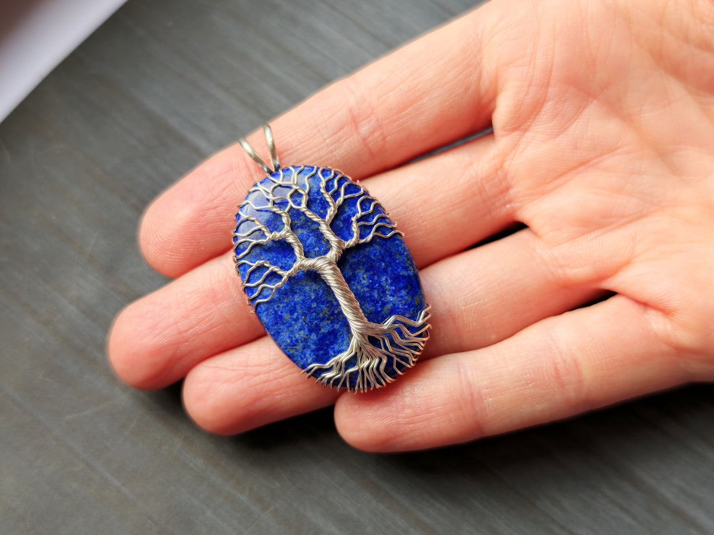 Tree pendant with a lapis lazuli gemstone