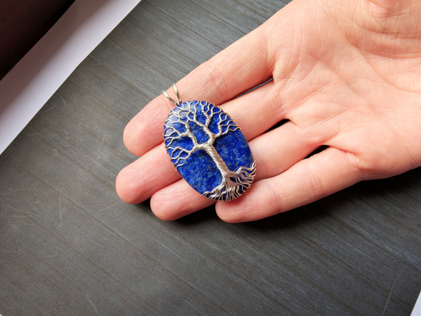 Tree pendant with a lapis lazuli gemstone