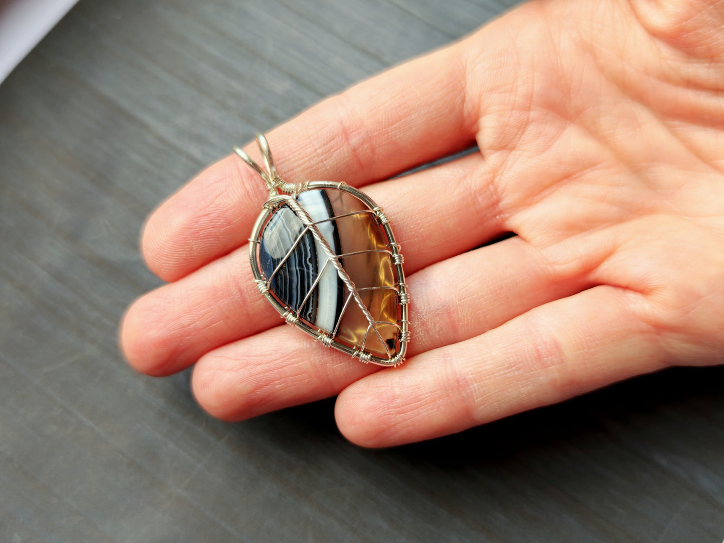 Leaf pendant with a black onyx gemstone