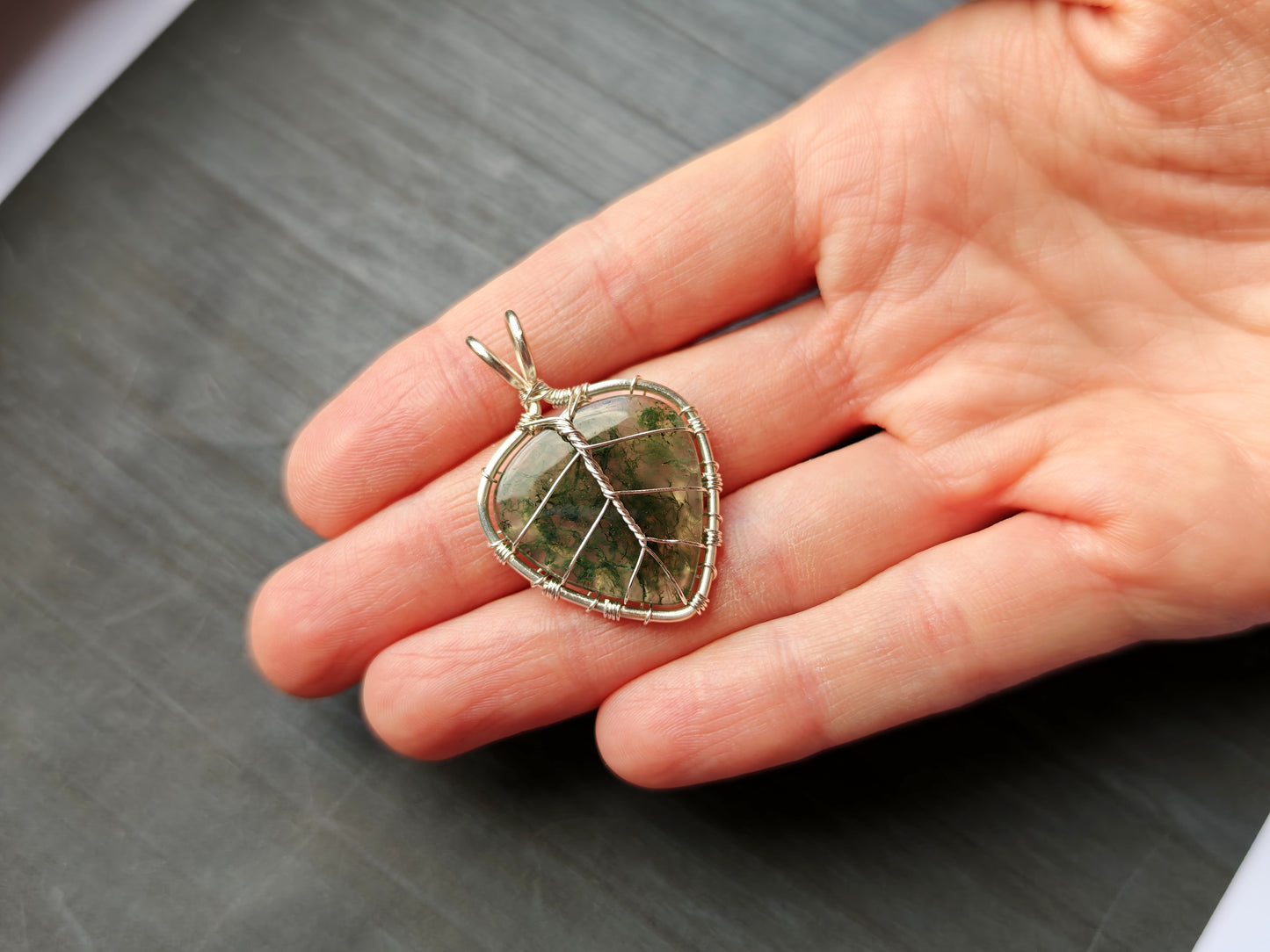 Leaf pendant with a moss agate gemstone