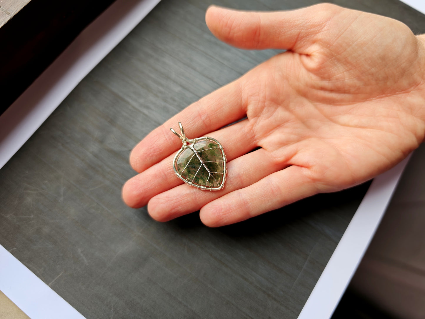 Leaf pendant with a moss agate gemstone