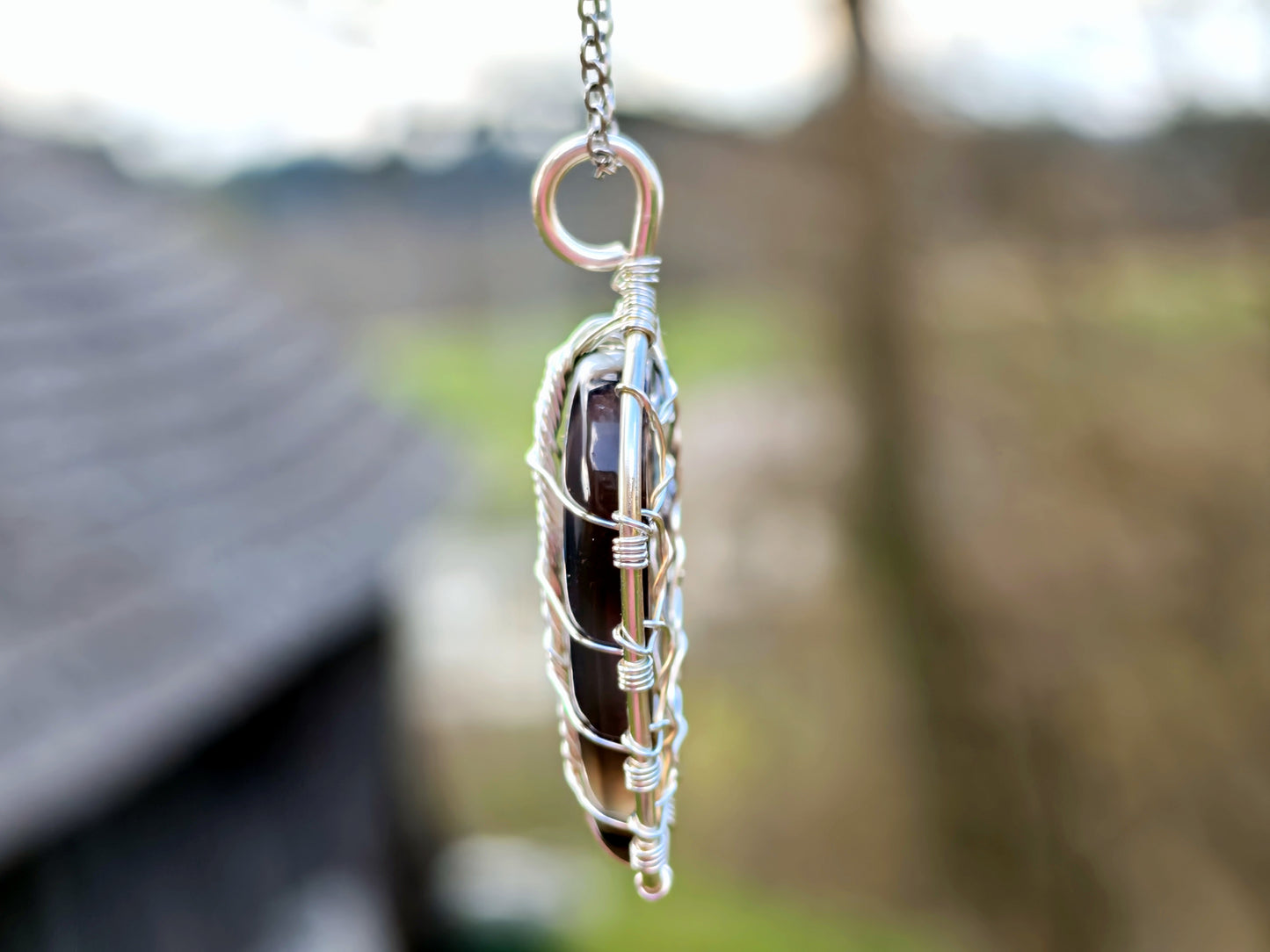 Leaf pendant with a black onyx gemstone