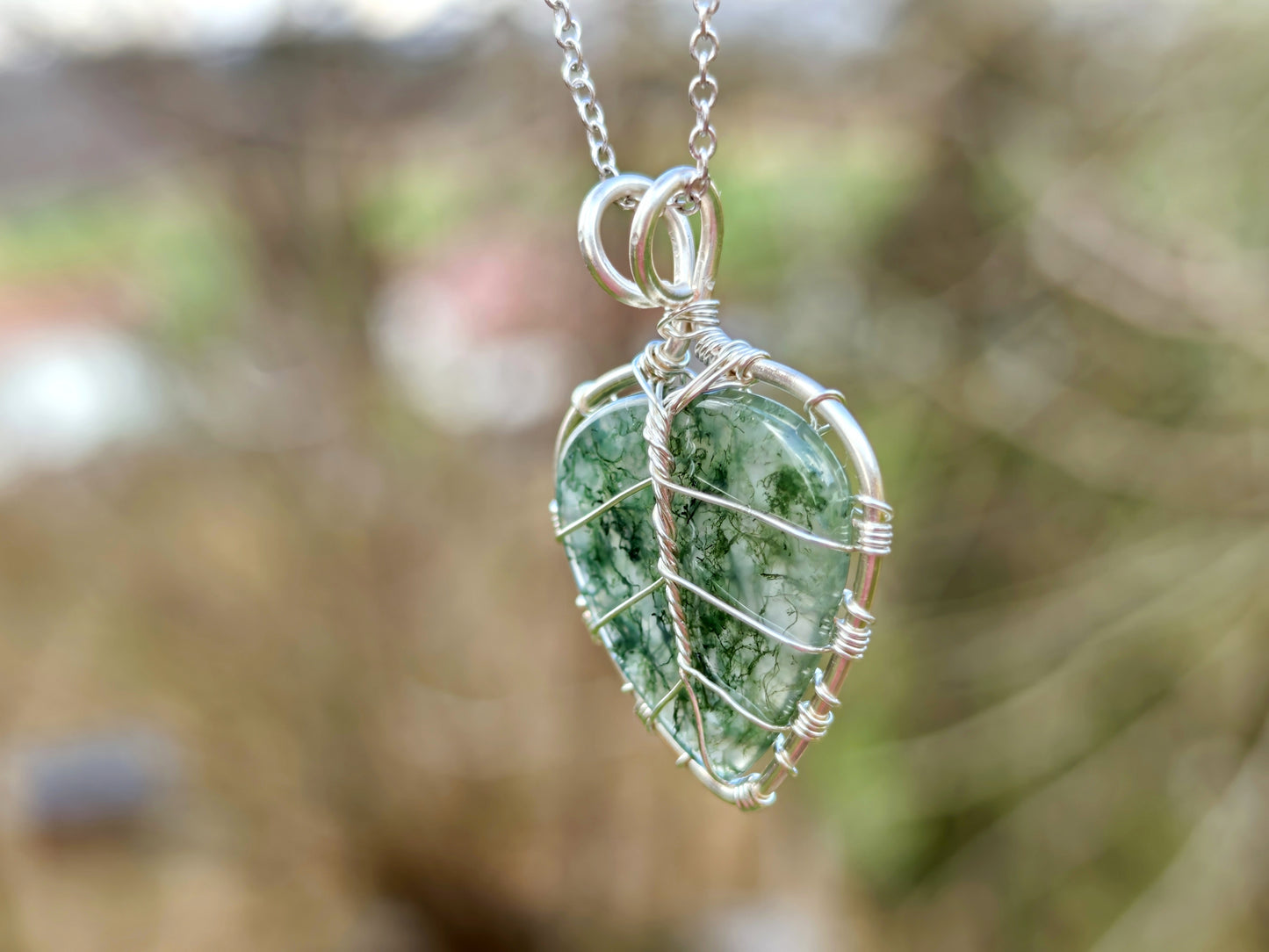 Leaf pendant with a moss agate gemstone