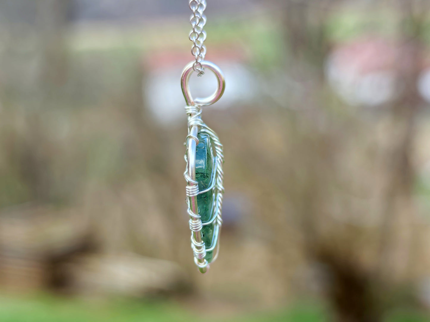 Leaf pendant with a moss agate gemstone