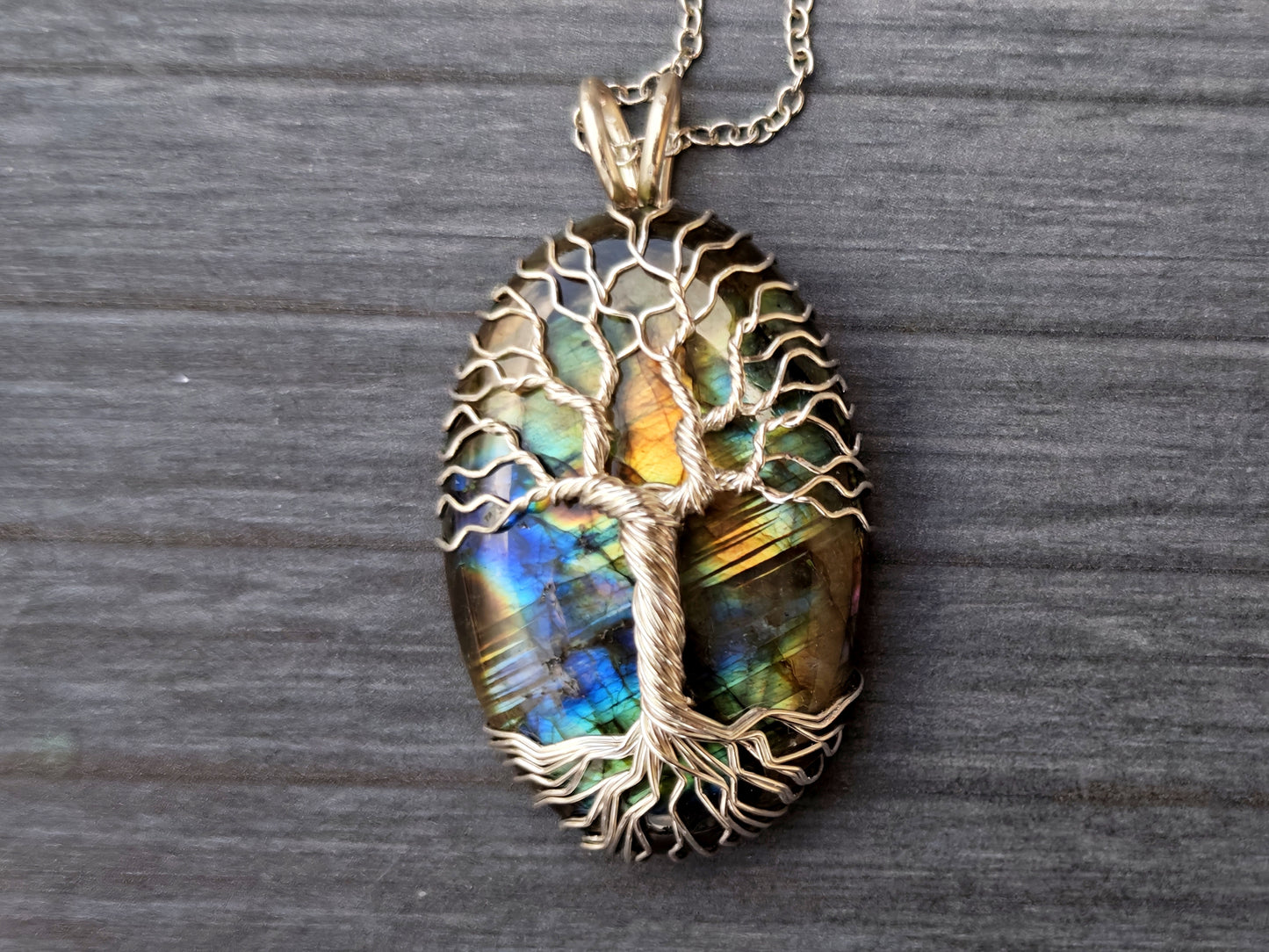 Tree pendant with a labradorite gemstone