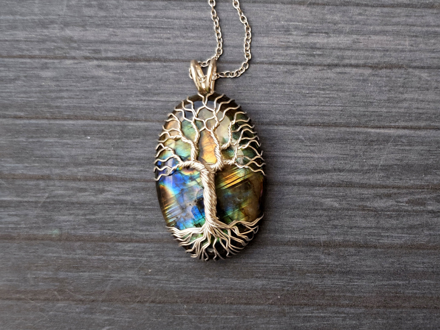 Tree pendant with a labradorite gemstone