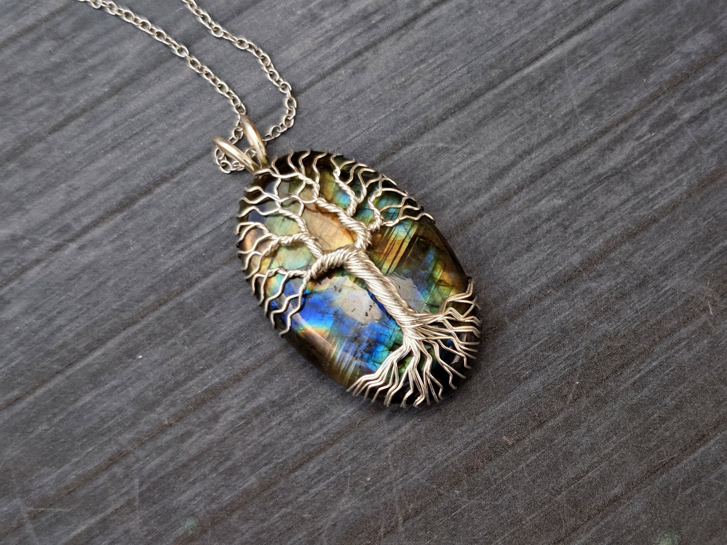 Tree pendant with a labradorite gemstone