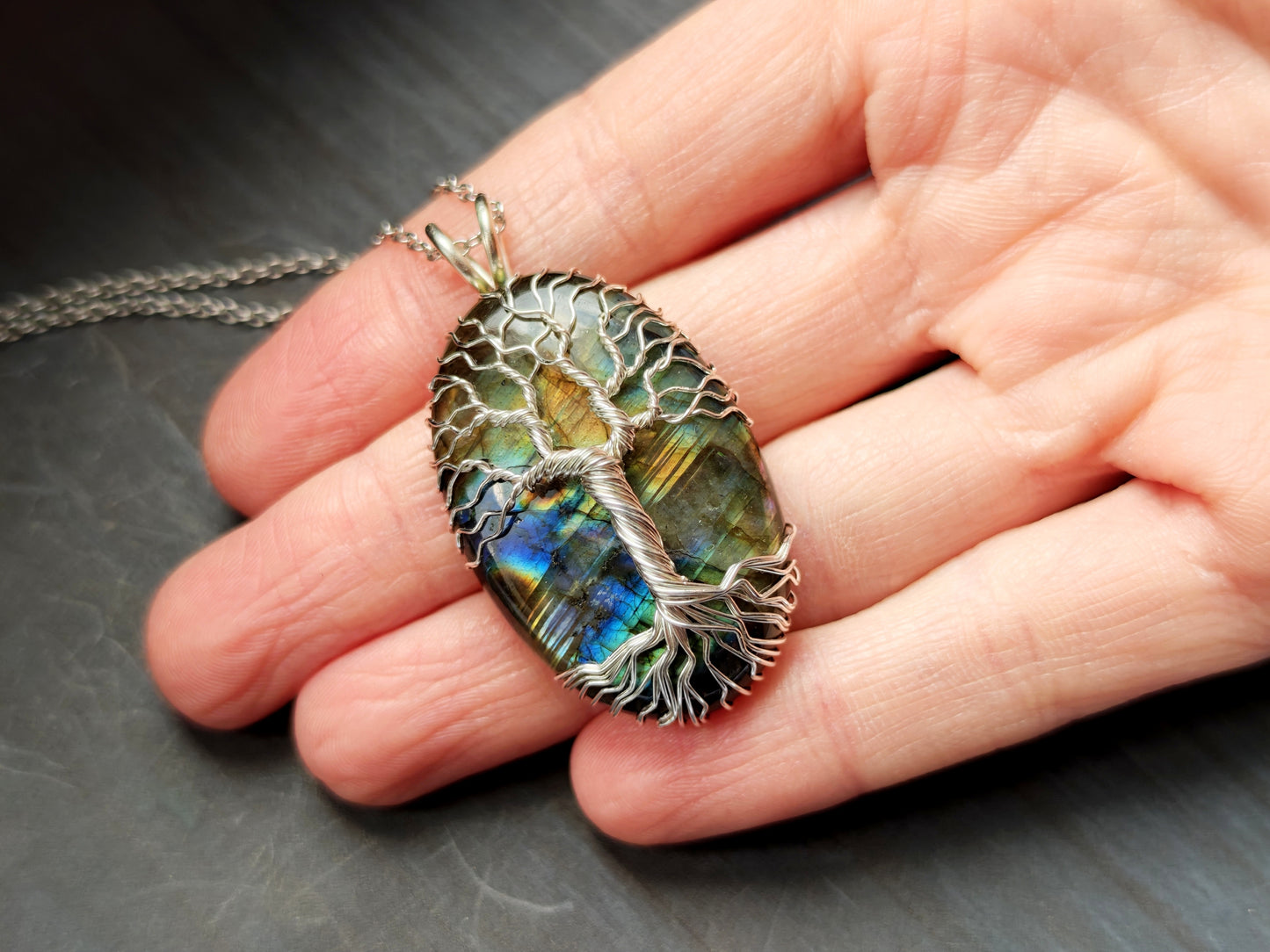 Tree pendant with a labradorite gemstone
