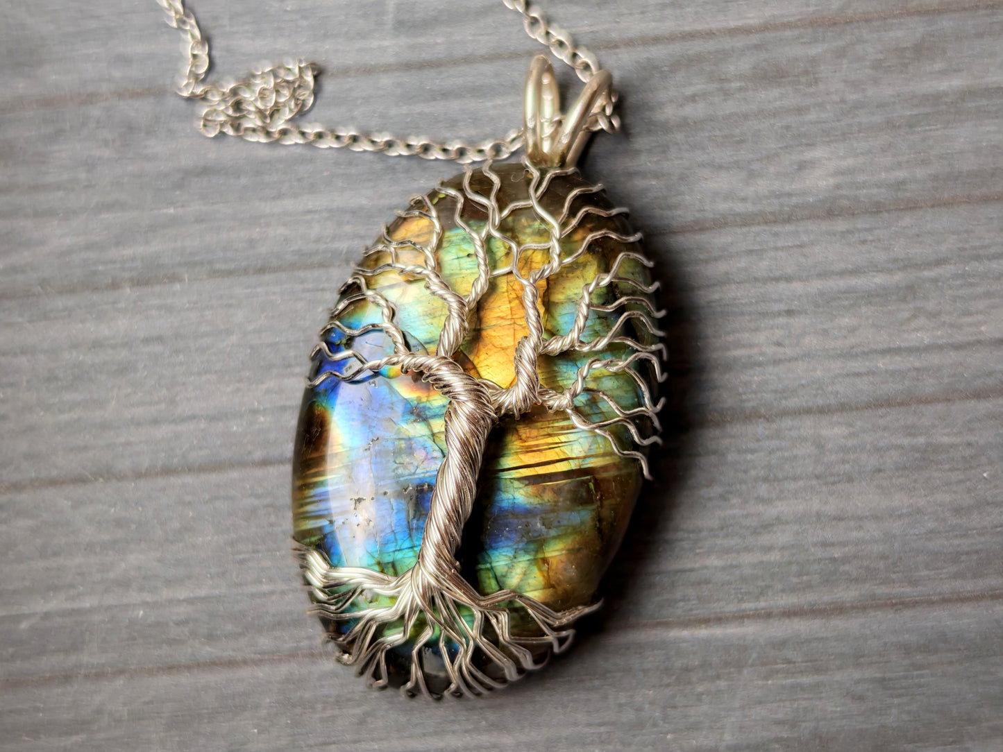 Tree pendant with a labradorite gemstone
