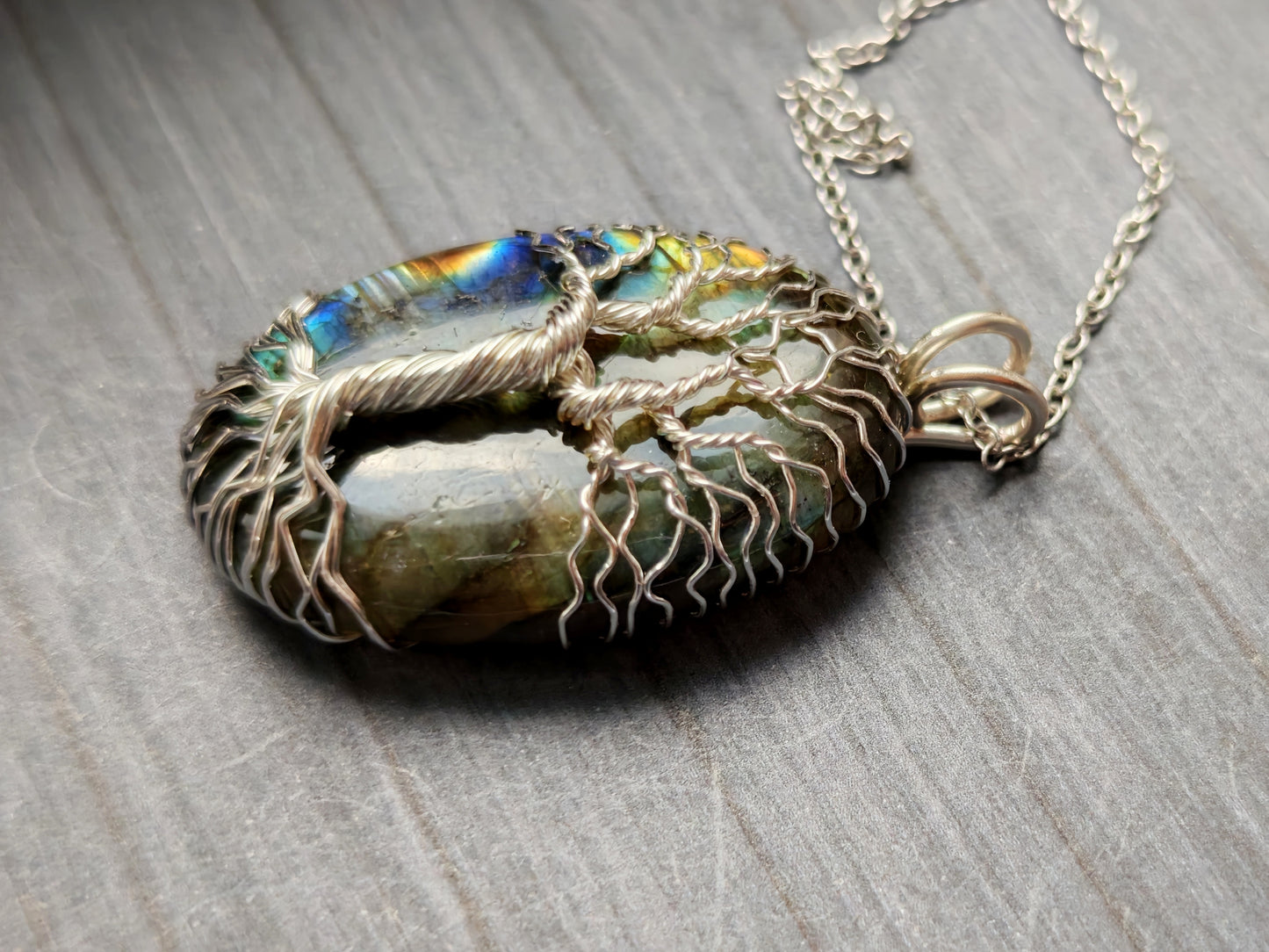 Tree pendant with a labradorite gemstone