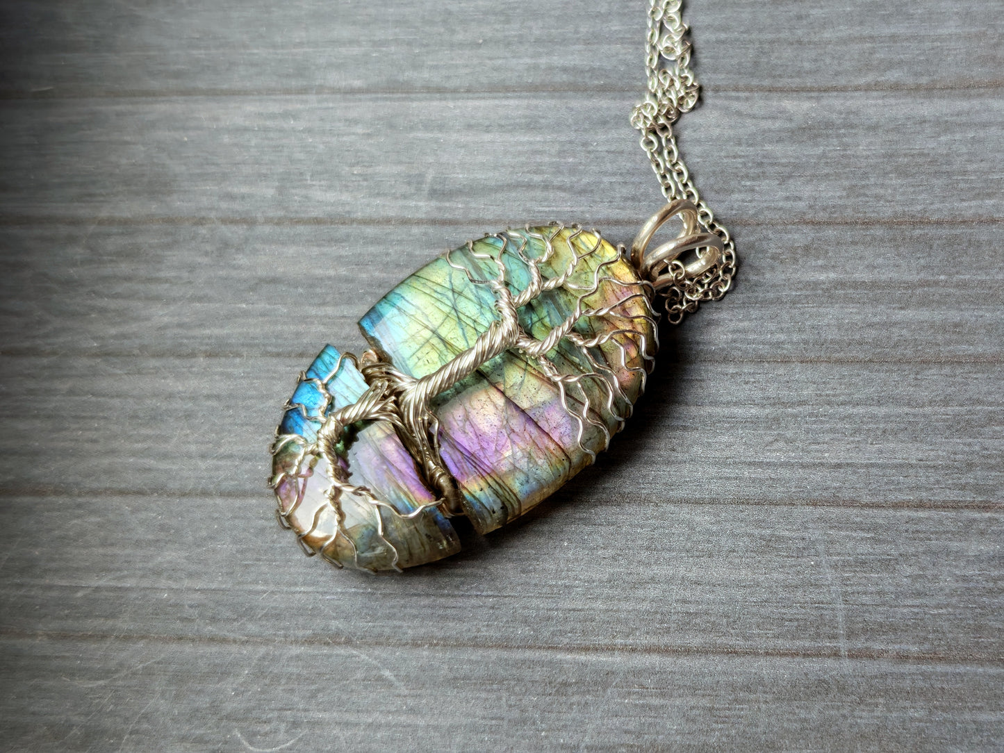 Tree pendant with a broken labradorite gemstone