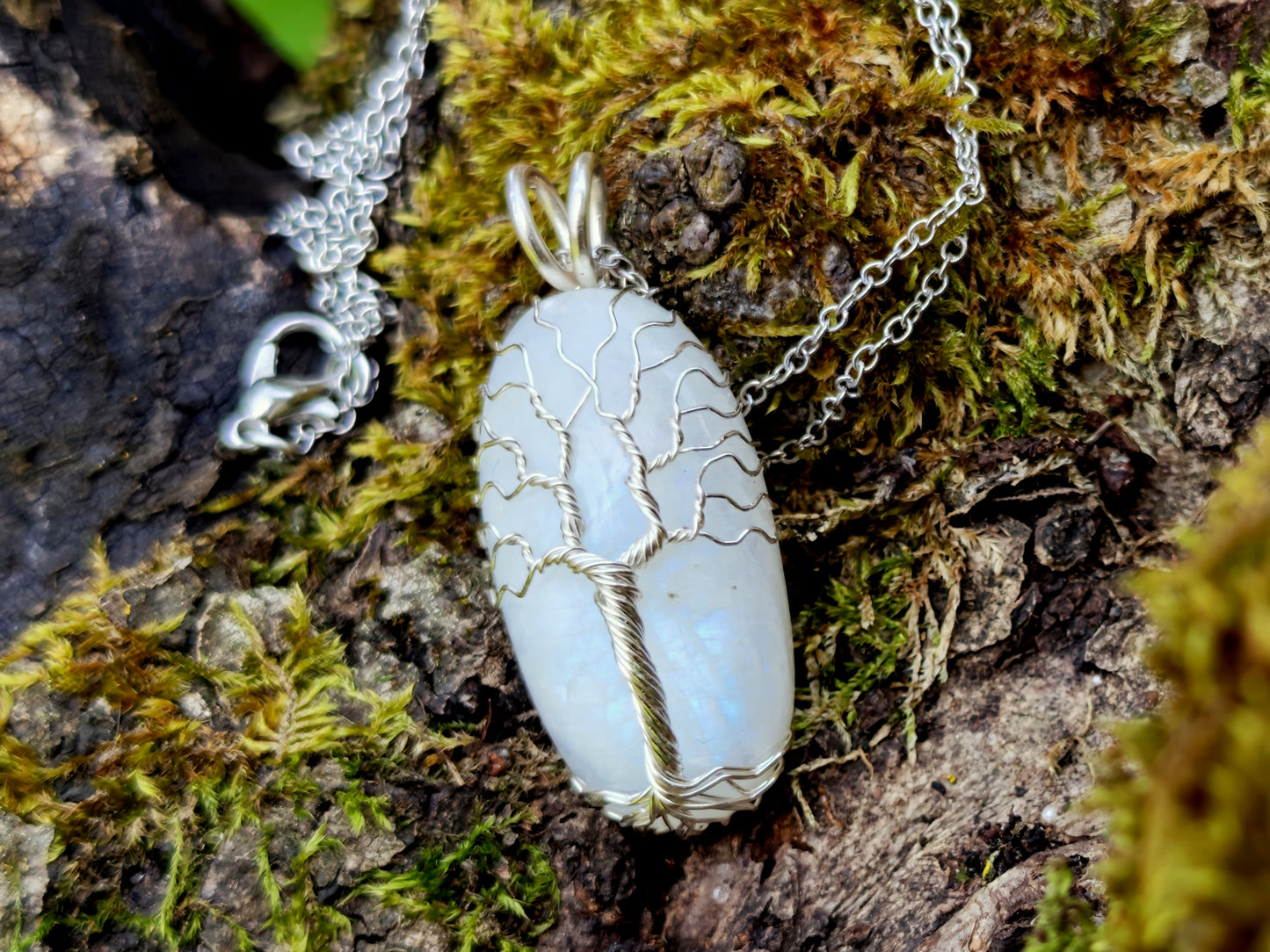 Tree pendant with a moonstone gemstone
