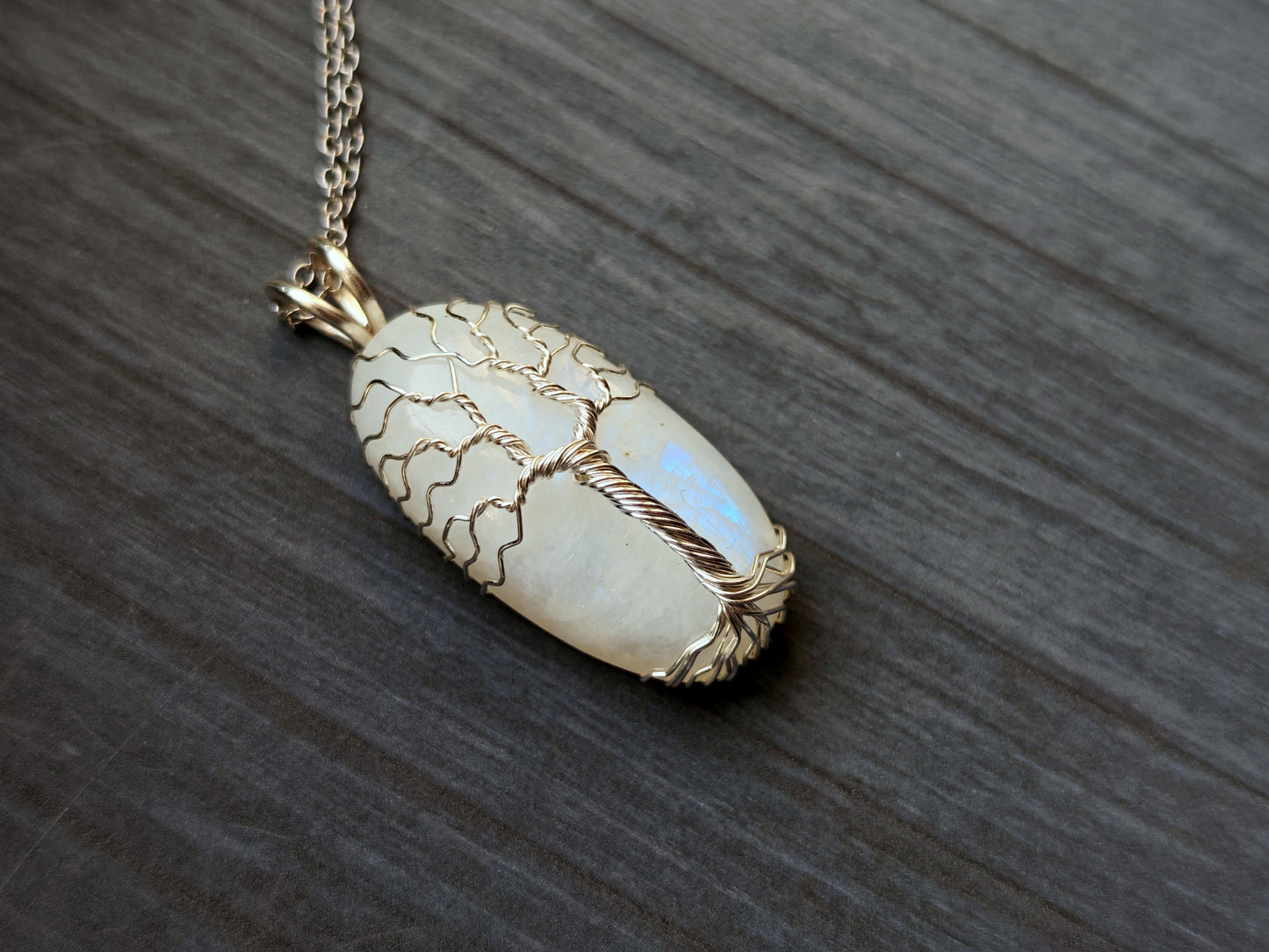 Tree pendant with a moonstone gemstone
