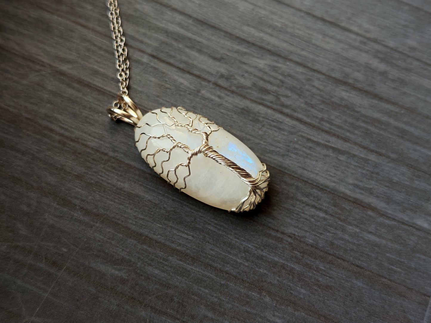 Tree pendant with a moonstone gemstone