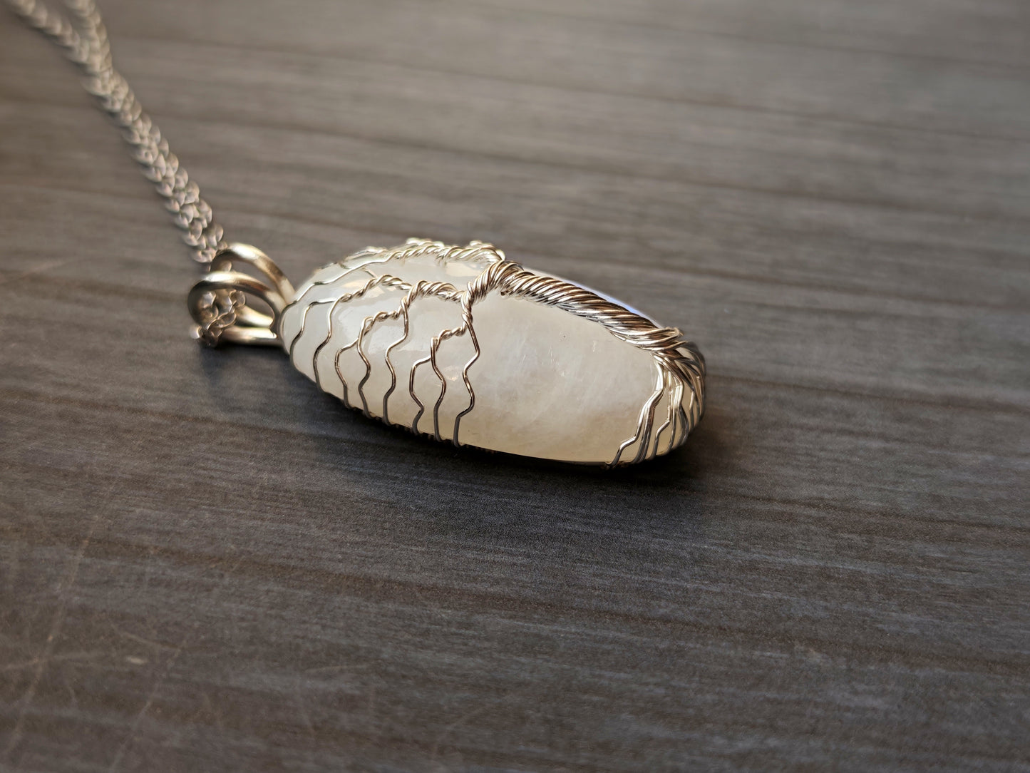 Tree pendant with a moonstone gemstone