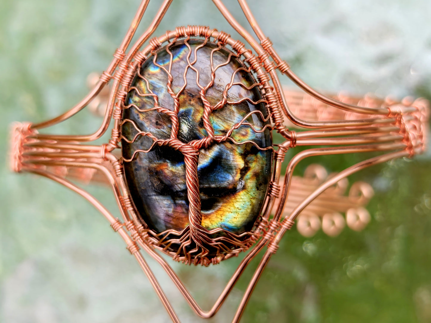 Tree arm ring with a labradorite gemstone